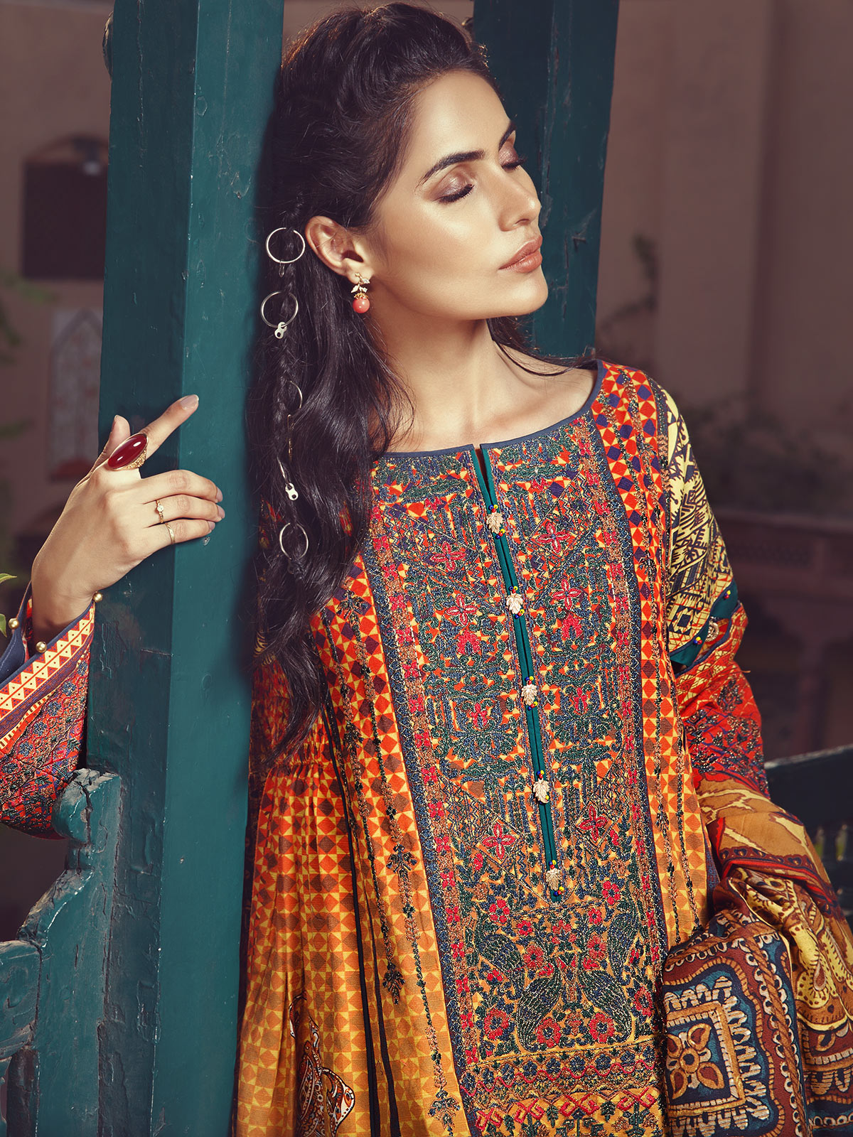 Orange 3 piece unstitched pret wear dress by Eden Robe Winter Collection 2019