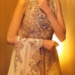 Buy this beautiful and attractive asian wedding outfit by Pakistani fashion designer at a reasonable cost.