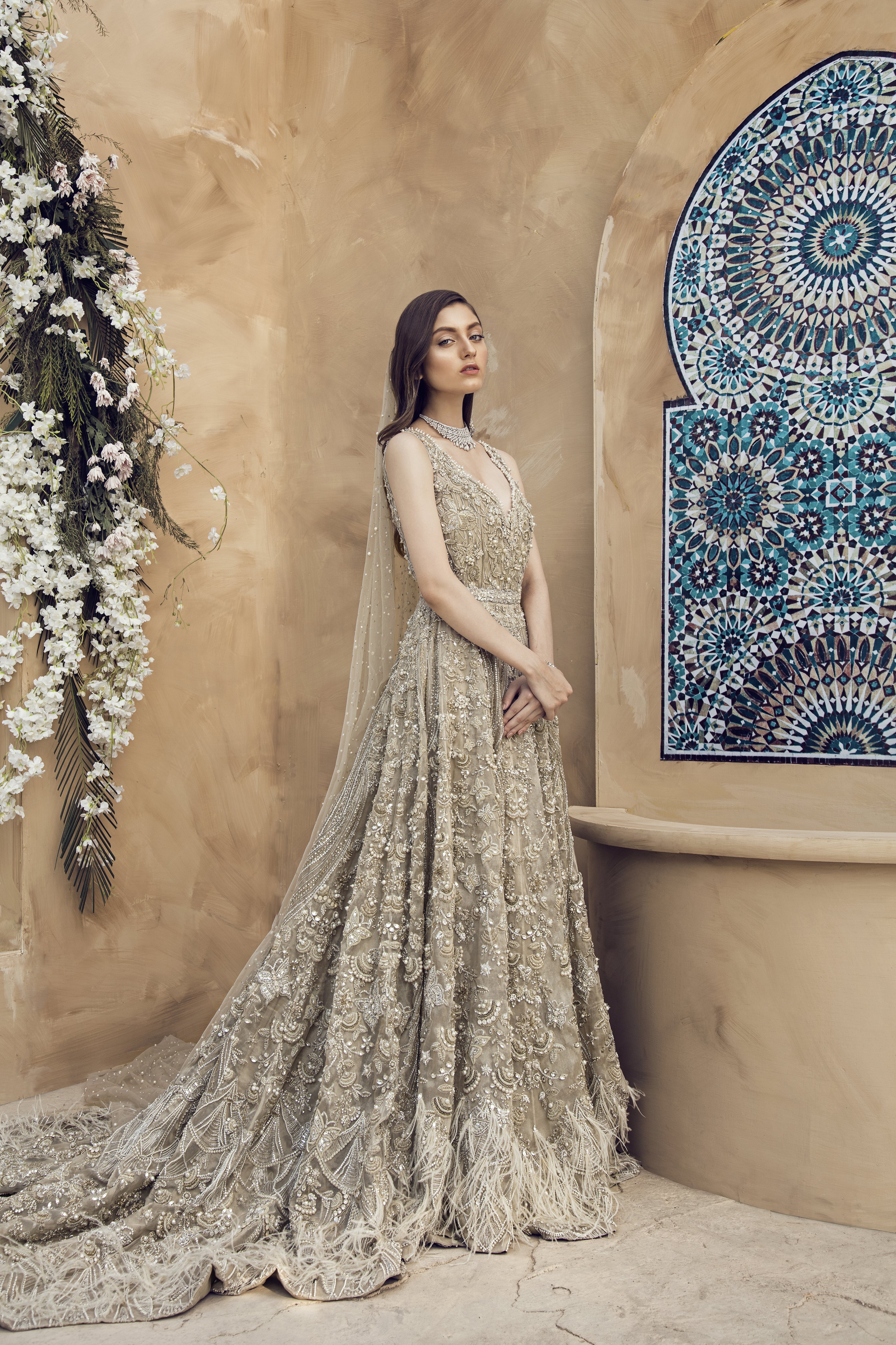 Buy this elegant Pakistani wedding dress by Pakistani fashion designers at a decent price