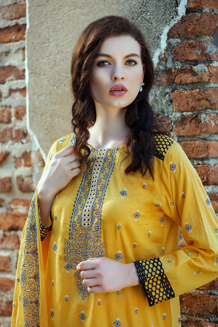 This beautiful Yellow lawn unstitched Pakistani dress by Taana Baana embroidered spring collection 2019