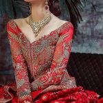 This elegant hand worked Pakistani wedding wear dress by renowed Pakistani fashion designer