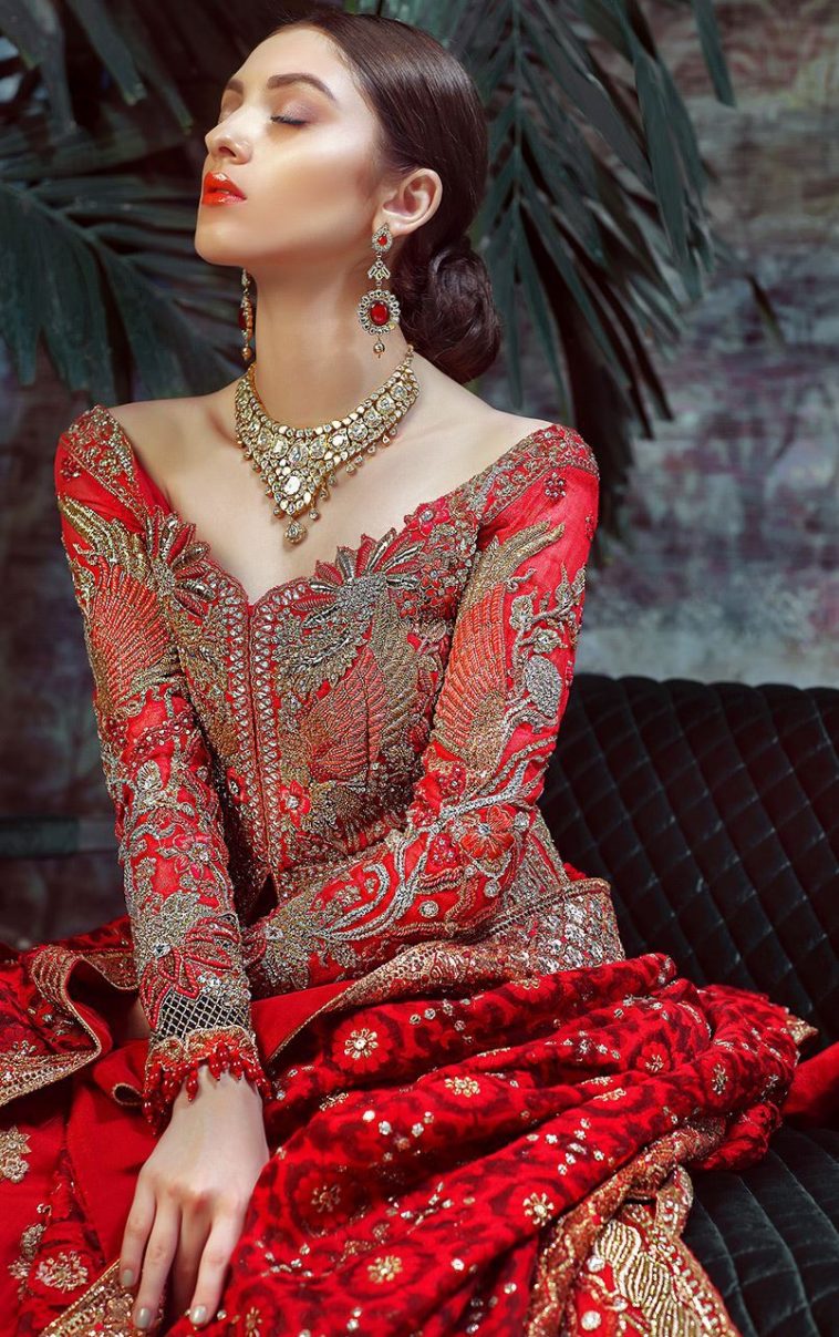 This elegant hand worked Pakistani wedding wear dress by renowed Pakistani fashion designer