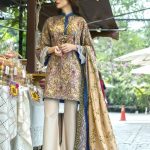 Beautiful brown Pakistani unstitched dress by Komal printed casuals 2018