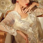 Vibrant and classic white colored two piece unstitched lawn dress by Tena Durrani embroidered Eid prets 2018
