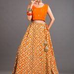 Orange embellished raw silk lehanga by Sanober Azfer Pakistani wedding dresses available online