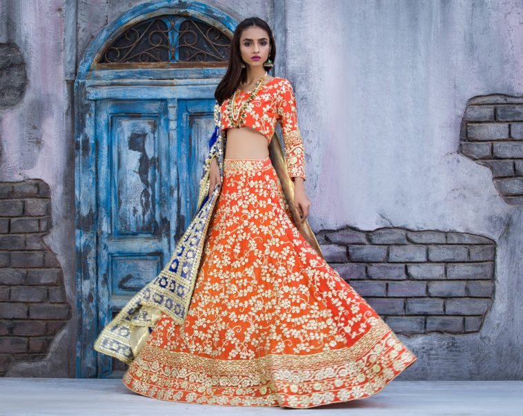 This elegant gotta work silk lehange in orange color available online by Pakistani orange color silk lehanga choli by Sanober Azfar Lehanga collection