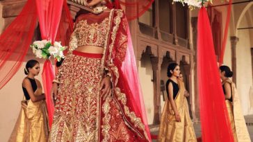 Red Bridal Lehenga by Erum Khan